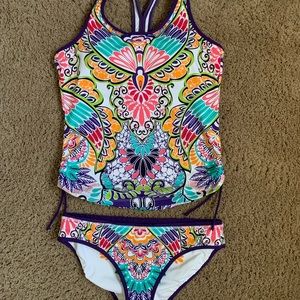 Woman’s Athleta Swimsuit medium